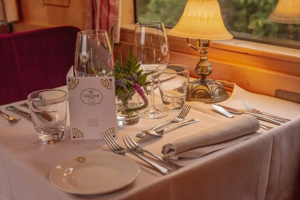 Dining table laid with crystal on the Costa Verde Express