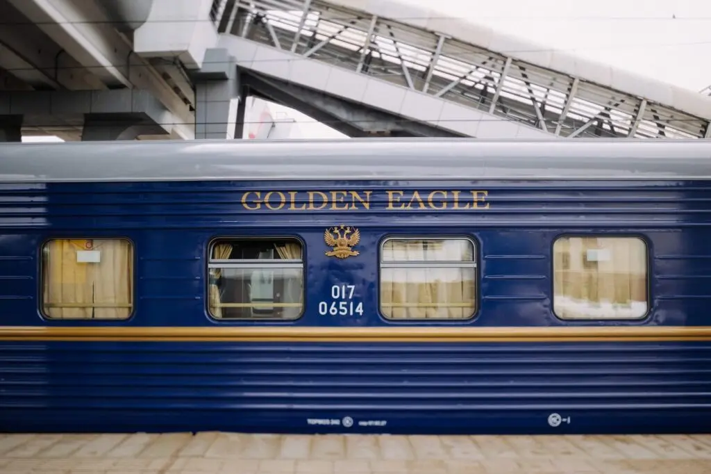 Blue Golden Eagle carriage at a station platform