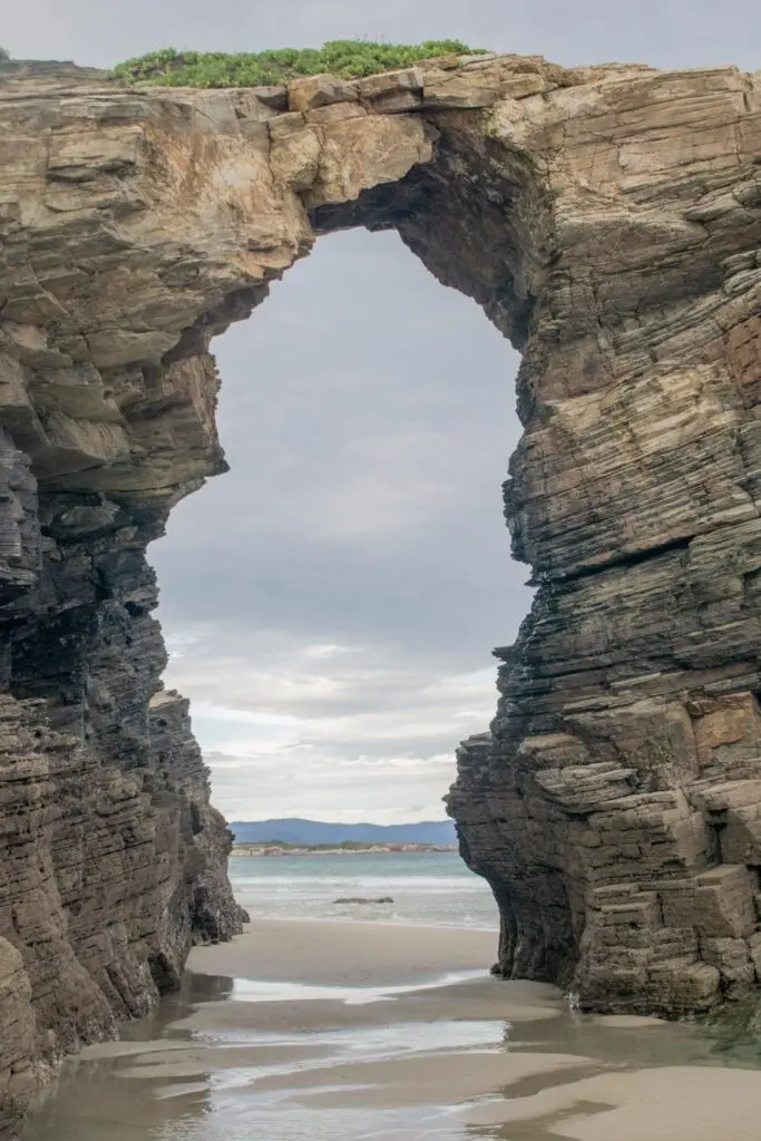 Rock arches at Playa de las Catedrales in Galicia